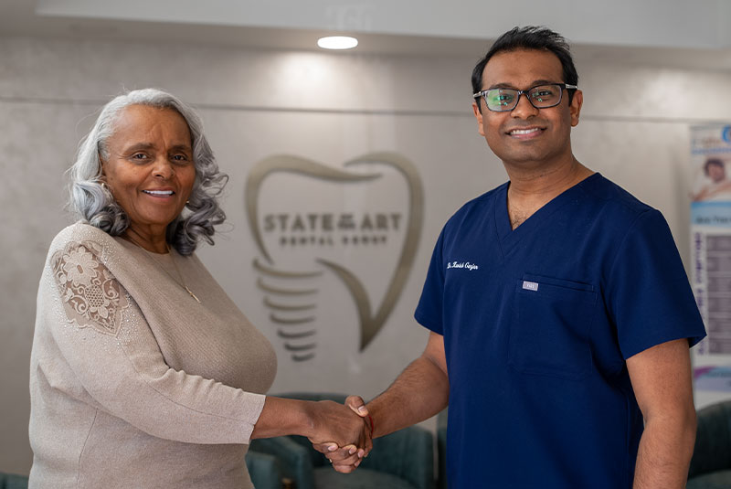 dr g with norma handshake